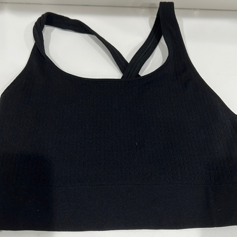 Fabletics NWOT sports top. Crossover back.
